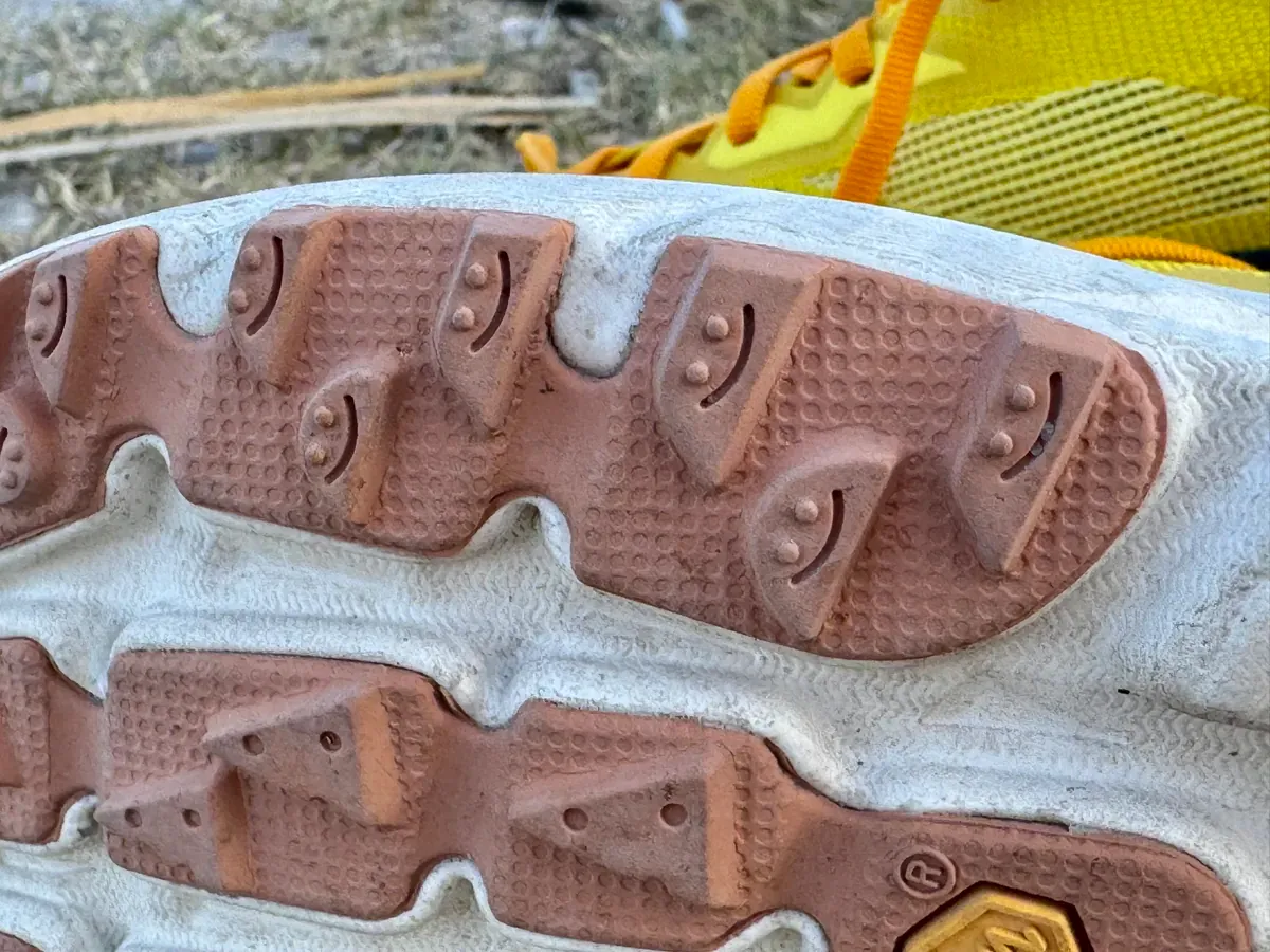 smiley faces 😊 and pizza slices 🍕 on the Vibram Megagrip outsole